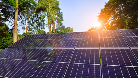 Solar panels with a large surface. Photovoltaic panels standing on a paved surface against the...