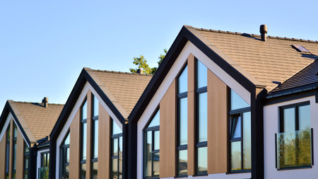 Suburban neighborhood with condominium complex. Suburban area with modern geometric family houses....