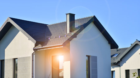 New build single family house. Suburban area with modern geometric family house.の写真素材