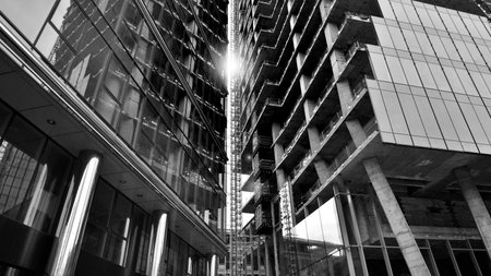 View of a skyscraper under construction. Modern architecture background. Building a high-rise...