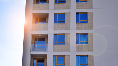 Modern architecture of urban residential apartment building. Apartment building exterior, residential house facade.の写真素材