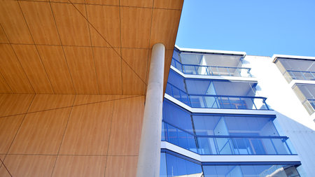 A apartment building with a unique architectural solution. A modern residential building with a...