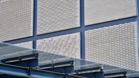 Facade of building with modern elements. Exterior of a modern industrial building.