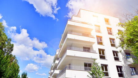 Eco apartment building saving energy and fresh air concept. European residential architecture...