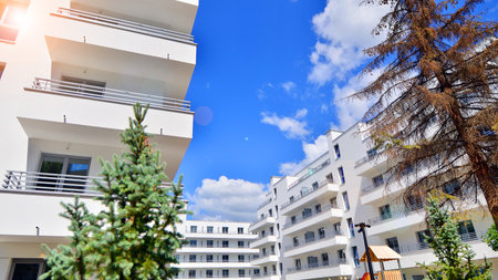 Eco apartment building saving energy and fresh air concept. European residential architecture...
