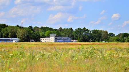 Goraszka, Poland. 15 July 2024. View of the former General Aviation Airport buildings and a grass runway.のeditorial素材