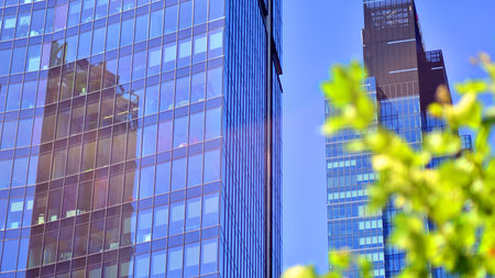 City life, urban landscape and ecology. Modern office complex with glass facades and smooth lines...