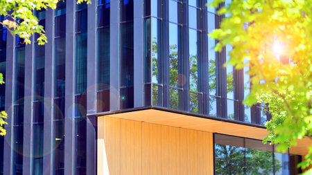 City life, urban landscape and ecology. Modern office complex with glass facades and smooth lines...
