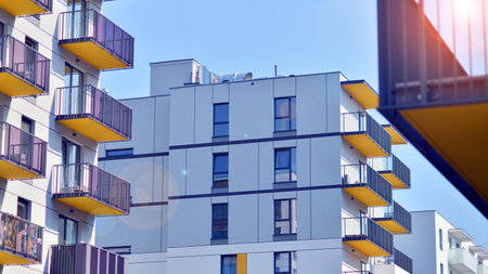 Modern architecture of urban residential apartment buildings on a sunny day. Facade of a modern...