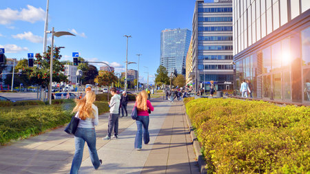 Szczecin, Poland. 14 September 2024.Downtown on a sunny day and street of a big city. People of different ages crossing the road through. View of a city street with residents and mのeditorial素材