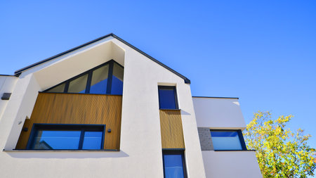 Residential homes with modern facade.Terraced family homes in newly developed housing estate. The...