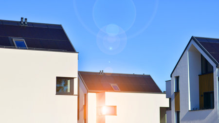 Residential homes with modern facade.Terraced family homes in newly developed housing estate. The...