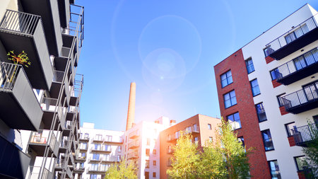 Modern eco friendly apartment buildings with green trees. Modern architectural design with greenery...