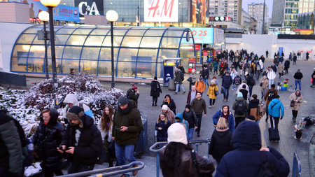 Warsaw, Poland. 22 November 2024. People of different ages and nationalities walk across in the city center, autumn time. People on the street.のeditorial素材