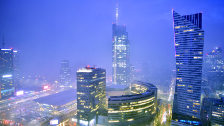 Warsaw, Poland. 3 January 2025. Business center panorama by night at fog. Amazing modern cityscape at night.のeditorial素材