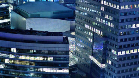 Aerial photography of modern architectural landscapes at night. Lights in the windows of buildings. The blue color of twilight.の写真素材