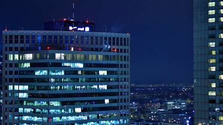 Aerial photography of modern architectural landscapes at night. Lights in the windows of buildings. The blue color of twilight.の写真素材