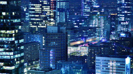 Aerial photography of modern architectural landscapes at night. Lights in the windows of buildings. The blue color of twilight.の写真素材