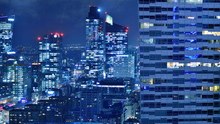Aerial photography of modern architectural landscapes at night. Lights in the windows of buildings. The blue color of twilight.の写真素材