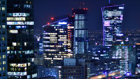 Aerial photography of modern architectural landscapes at night. Lights in the windows of buildings. The blue color of twilight.の写真素材