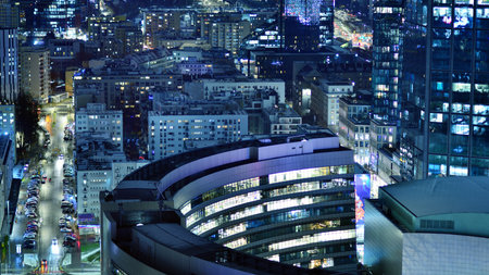 Aerial photography of modern architectural landscapes at night. Lights in the windows of buildings. The blue color of twilight.の写真素材