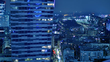 Aerial photography of modern architectural landscapes at night. Lights in the windows of buildings. The blue color of twilight.の写真素材