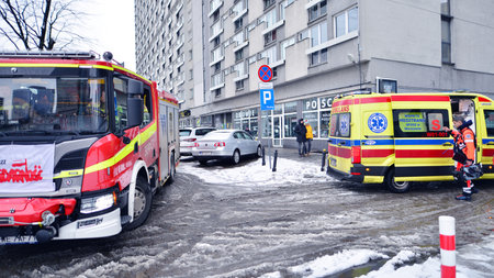 Warsaw, Poland. 12 January 2025. Accident on the city at winter day. Ambulance and fire truck with...