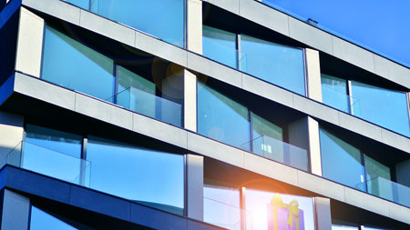 Large glass windows in a modern residential building. Modern urban architecture.の写真素材