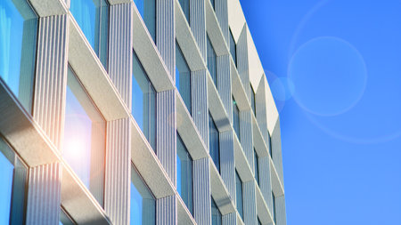 Large glass windows in a modern hotel building. Modern urban architecture. Large expansions of glass in concrete wall panels.の写真素材