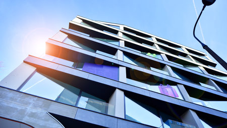 Large glass windows in a modern residential building. Modern urban architecture.の写真素材