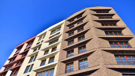 Modern apartment buildings on a sunny day with a blue sky. Facade of a modern apartment buildingの写真素材