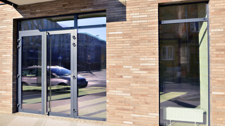 Modern residential building with ground floor commercial premises for shops and offices. Construction industry. Rental property.の写真素材