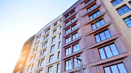 Modern apartment buildings on a sunny day with a blue sky. Facade of a modern apartment buildingの写真素材