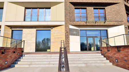 Modern residential building with ground floor commercial premises for shops and offices. Construction industry. Rental property.の写真素材