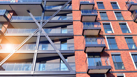 Modern apartment buildings on a sunny day with a blue sky. Facade of a modern apartment buildingの写真素材