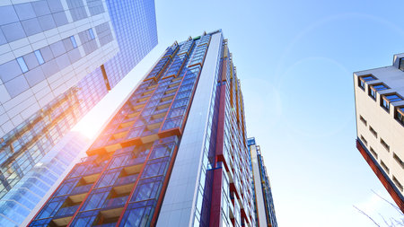 Modern and new apartment building. Multistory modern, new and stylish living block of flats.の写真素材