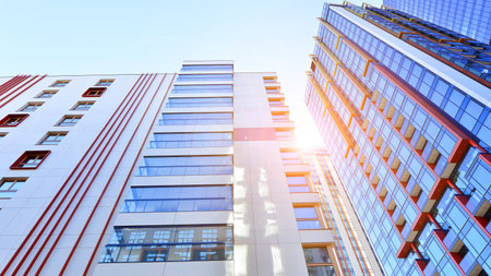 Modern and new apartment building. Multistory modern, new and stylish living block of flats.の写真素材