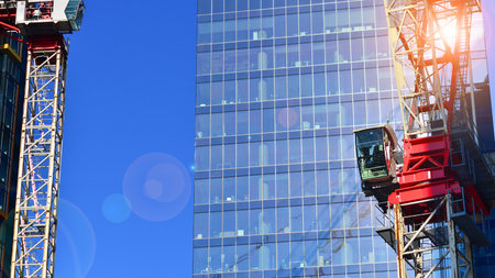 Modern and new apartment building. Multistory modern, new and stylish living block of flats.の写真素材