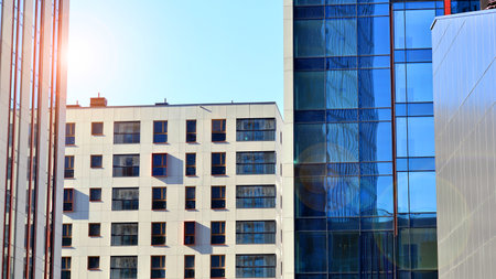 Modern and new apartment building. Multistory modern, new and stylish living block of flats.の写真素材