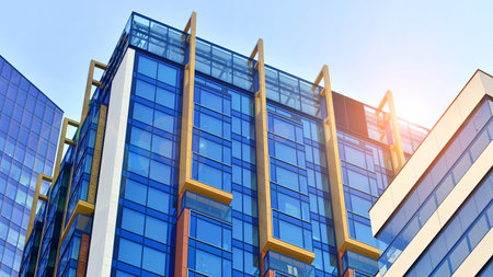 Modern and new apartment building. Multistory modern, new and stylish living block of flats.の写真素材