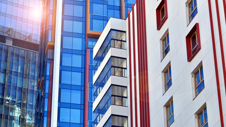 Modern and new apartment building. Multistory modern, new and stylish living block of flats.の写真素材
