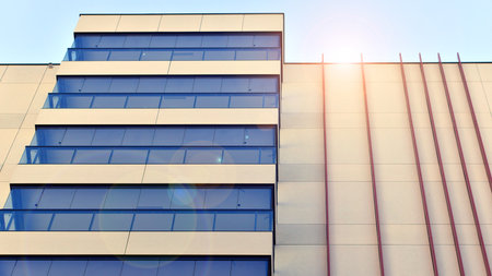 Modern and new apartment building. Multistory modern, new and stylish living block of flats.の写真素材