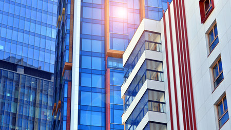 Modern and new apartment building. Multistory modern, new and stylish living block of flats.の写真素材