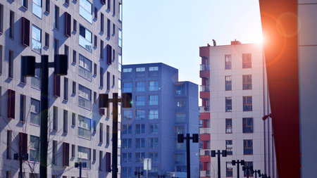 Modern and new apartment building. Multistory modern, new and stylish living block of flats.の写真素材