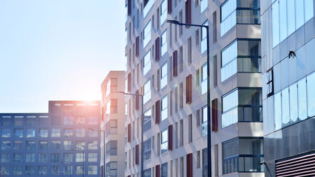 Modern and new apartment building. Multistory modern, new and stylish living block of flats.の写真素材