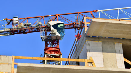 New multistory modern apartment buildings under construction in sunny day.の写真素材