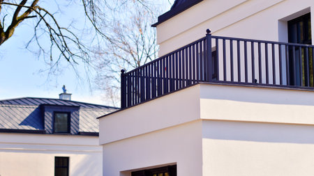 Luxury real estate single family house with white modern facade. A suburban district of single-family homes.の写真素材