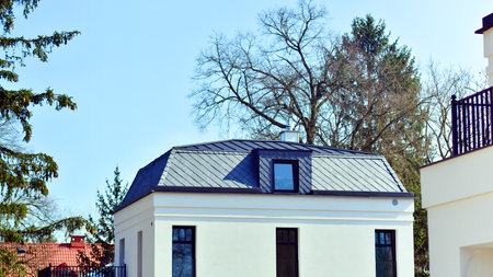 Luxury real estate single family house with white modern facade. A suburban district of single-family homes.の写真素材