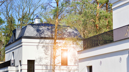 Luxury real estate single family house with white modern facade. A suburban district of single-family homes.の写真素材