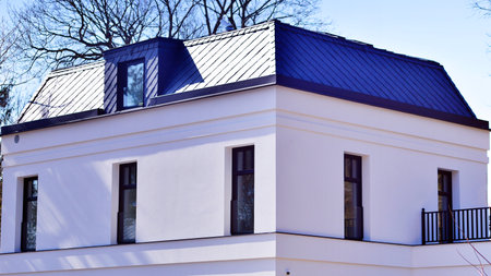 Luxury real estate single family house with white modern facade. A suburban district of single-family homes.の写真素材